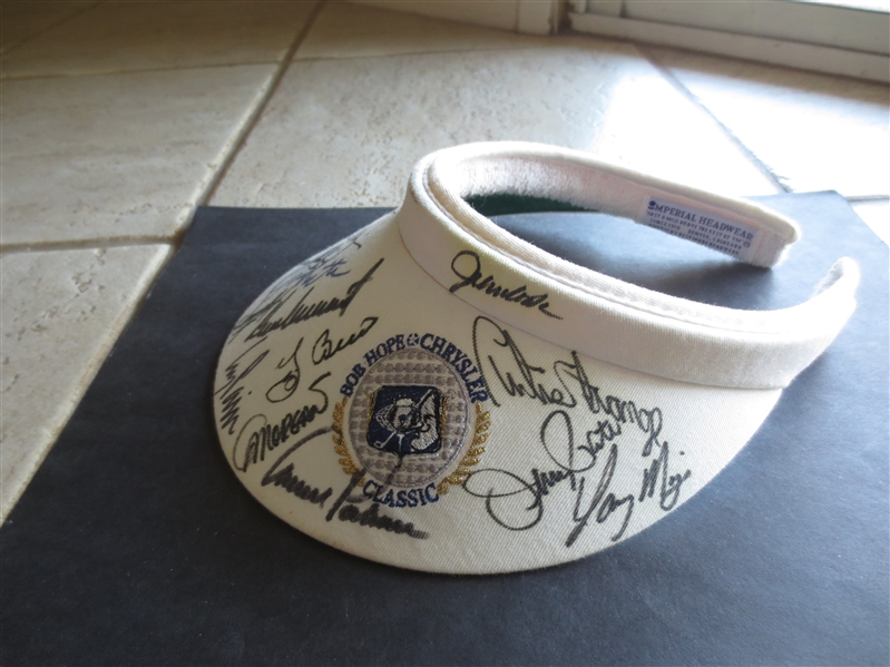 Autographed 1995 Bob Hope Chrysler Golf Classic Visor with 16 signatures including Arnold Palmer and Mark OMeara