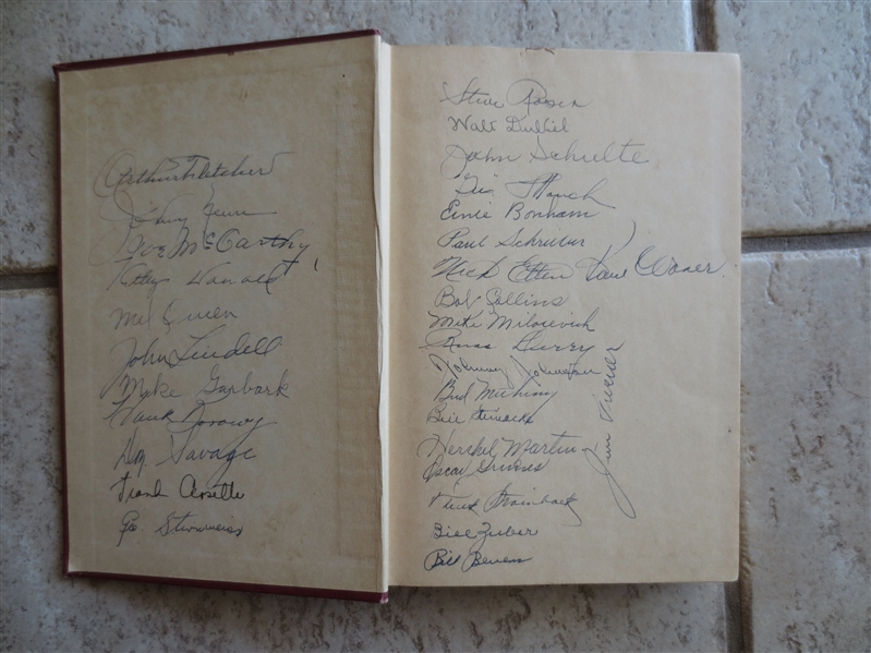 Autographed 1944 New York Yankees Hardcover Book with 31 Signatures including Joe McCarthy, Frank Crosetti, Snuffy Stirnweiss, Paul Waner Atley Donald and more from teammate!