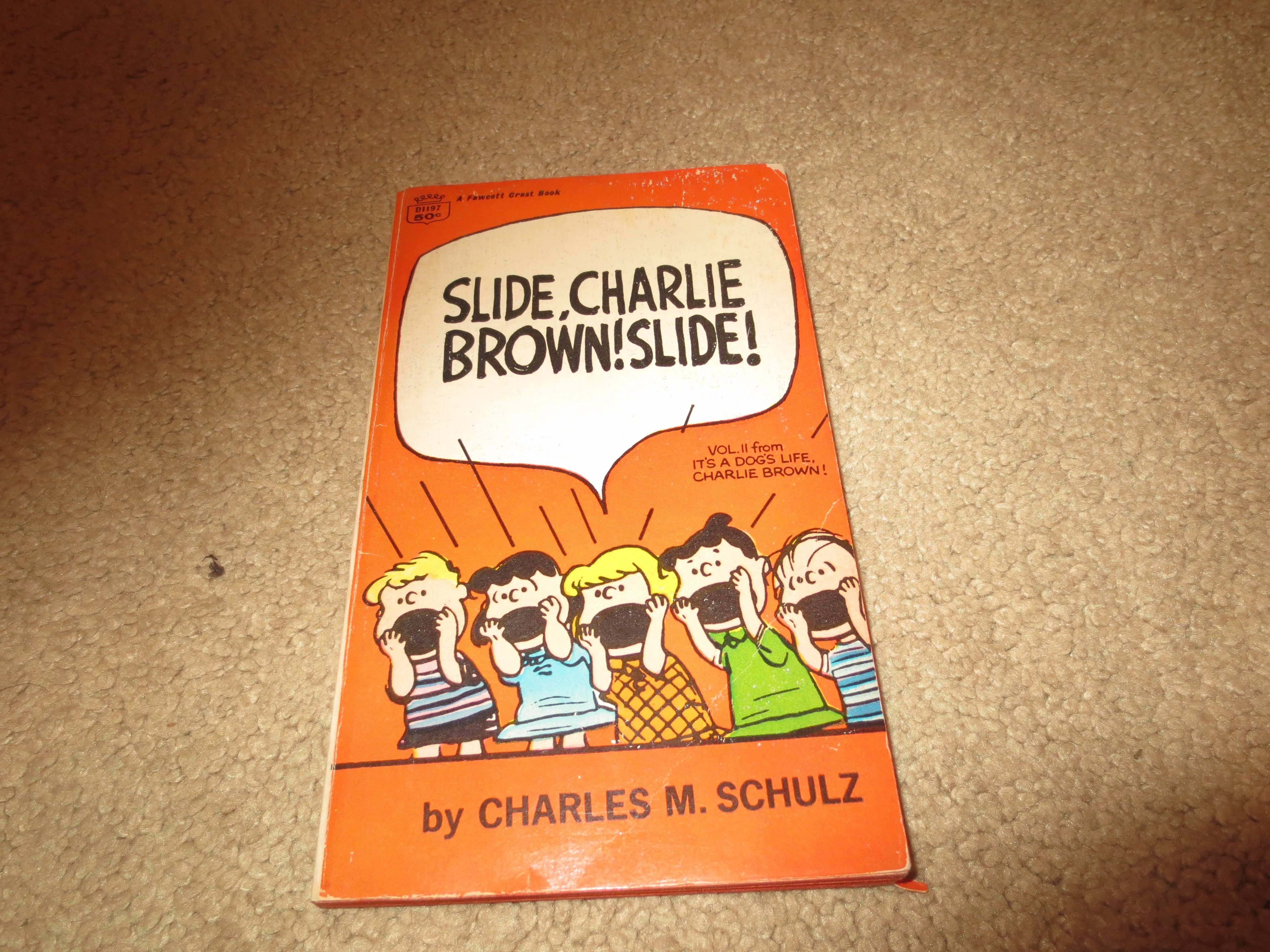 Lot Detail - Slide, Charlie Brown! Slide! softcover book by Charles ...